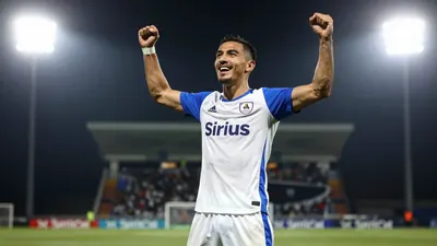 A photorealistic image of a Sirius player celebrating a goal with a floodlight rim light, and a clean white jersey with...