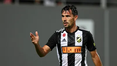 A 35-year-old Häcken midfielder, 5'10" with a rugged build, stands in the tunnel at Bravida Arena, his face set in a...